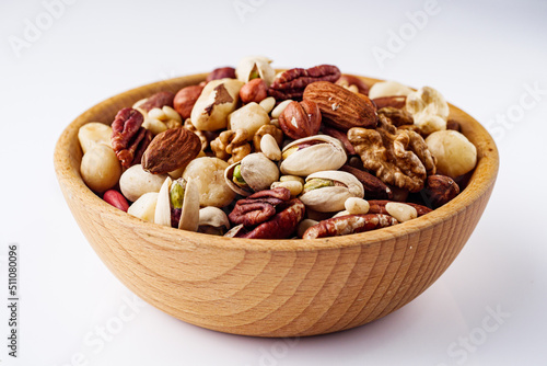 set of different nuts on a white acrylic background