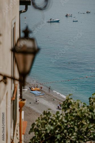 Fotografia Positano, Amalfi Coast in Italy- the view of peaceful blue sea and luxury charte