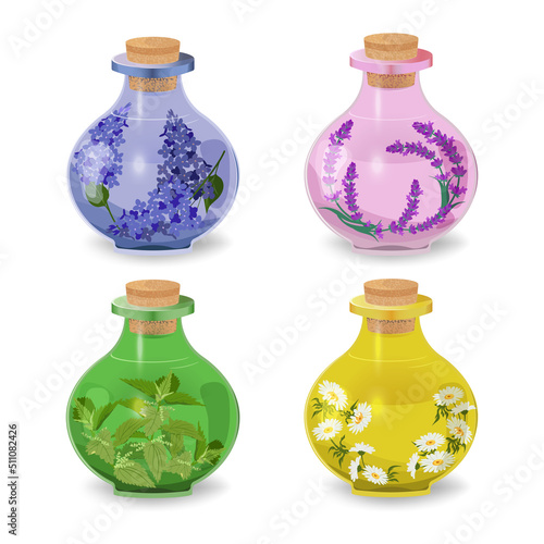 Collection of bottles with oils on a white isolated background.