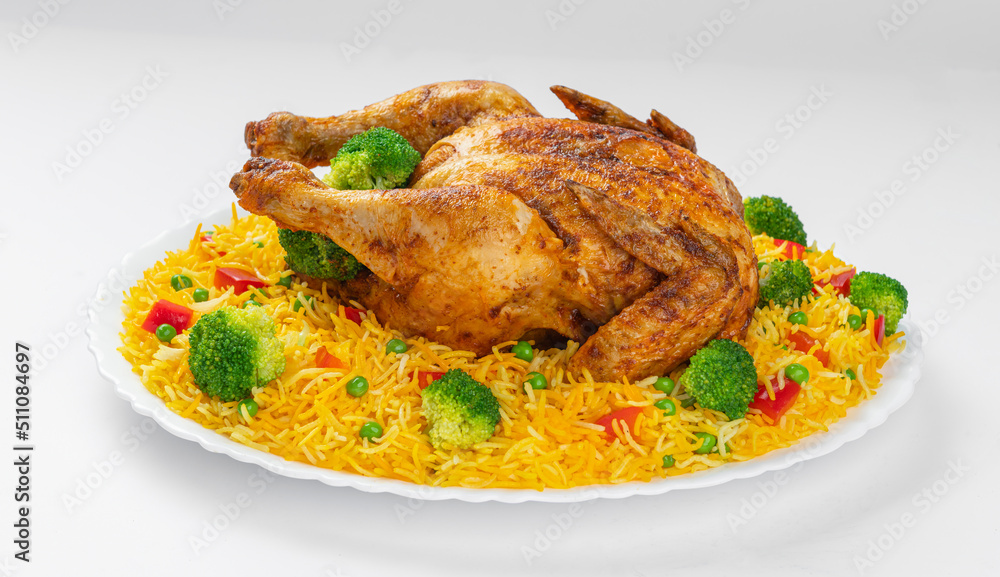 Full Chargha (Whole Grilled Chicken) with Vegetables and Saffron Rice. Extremely Delicious and Spicy Food. This food also called Mandee in Arab Countries. Full Chargha (Whole Grilled Chicken) with Vegetables and Saffron Rice. Extremely Delicious and Spicy Food. This food also called Mandee in Arab Countries.