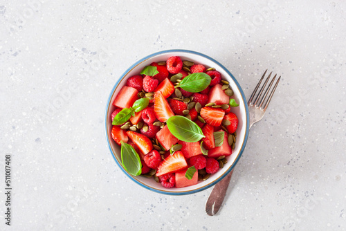 watermelon salad with strawberry raspberry basil seeds. healthy summer dessert