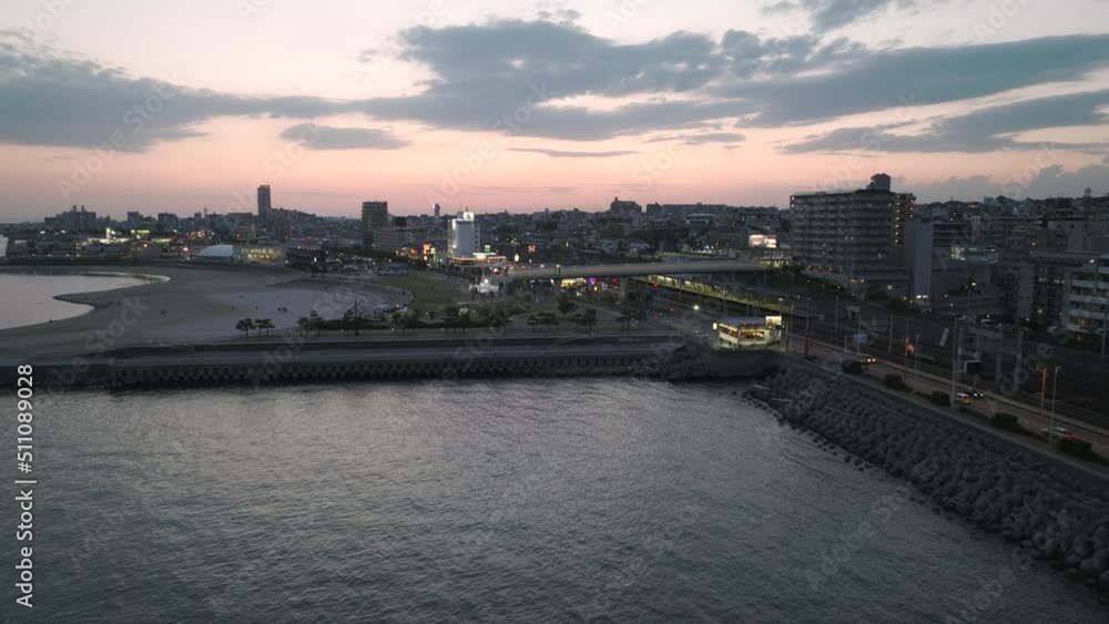 Flying towards Asagiri Station and Okura Kaigan at sunset Flying towards Asagiri Station and Okura Kaigan at sunset