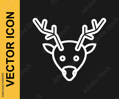 White line Reindeer icon isolated on black background. Merry Christmas and Happy New Year. Vector