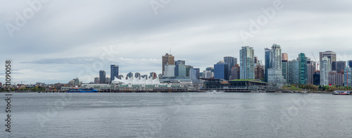 Panoramic View of Coal Harbour, Canada Place and Urban Buildings. Cloudy Evening Sky. Downtown Vancouver, British Columbia, Canada.