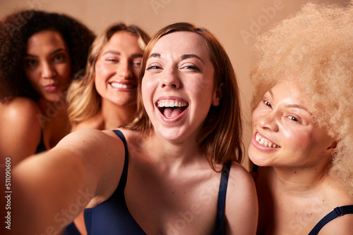 Group Of Diverse Body Positive Women Friends In Underwear Posing For Selfie On Mobile Phone
