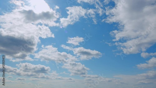 White clouds background. Blue sky with copyspace background. photo