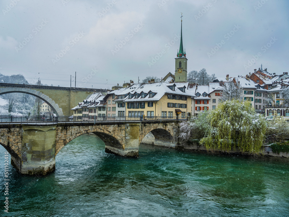 Nydeggbrucke and untertorbrucke bridge and swiss buildings on Aare in Bern, Switzerland
