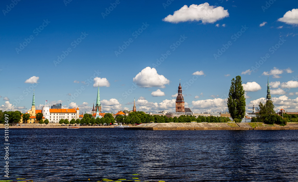 Famous panorama of Riga with St. Peter's Church and Riga Cathedral anther side of Daugava rive- fantastic architecture of Middle Ages Latvian capital, picturesque, Famous panorama of Riga with St. Peter's Church and Riga Cathedral anther side of Daugava rive- fantastic architecture of Middle Ages Latvian capital, picturesque,