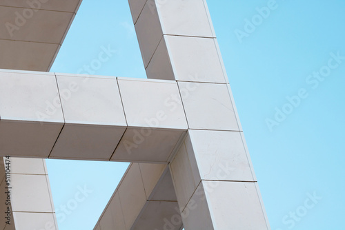 Abstract contemporary architecture. Close  up of some colunms  in a modern building.