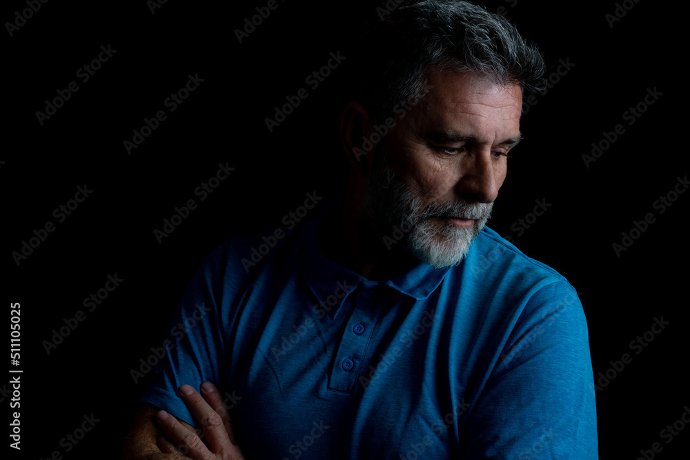 Man sitting alone felling sad worry or fear Man sitting alone felling sad worry or fear