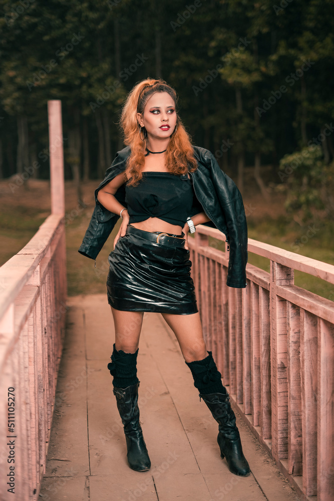 Portrait of Beautiful Model outdoor. close up portrait of young model standing in wooden Bridge. Portrait of Beautiful Model outdoor. close up portrait of young model standing in wooden Bridge.