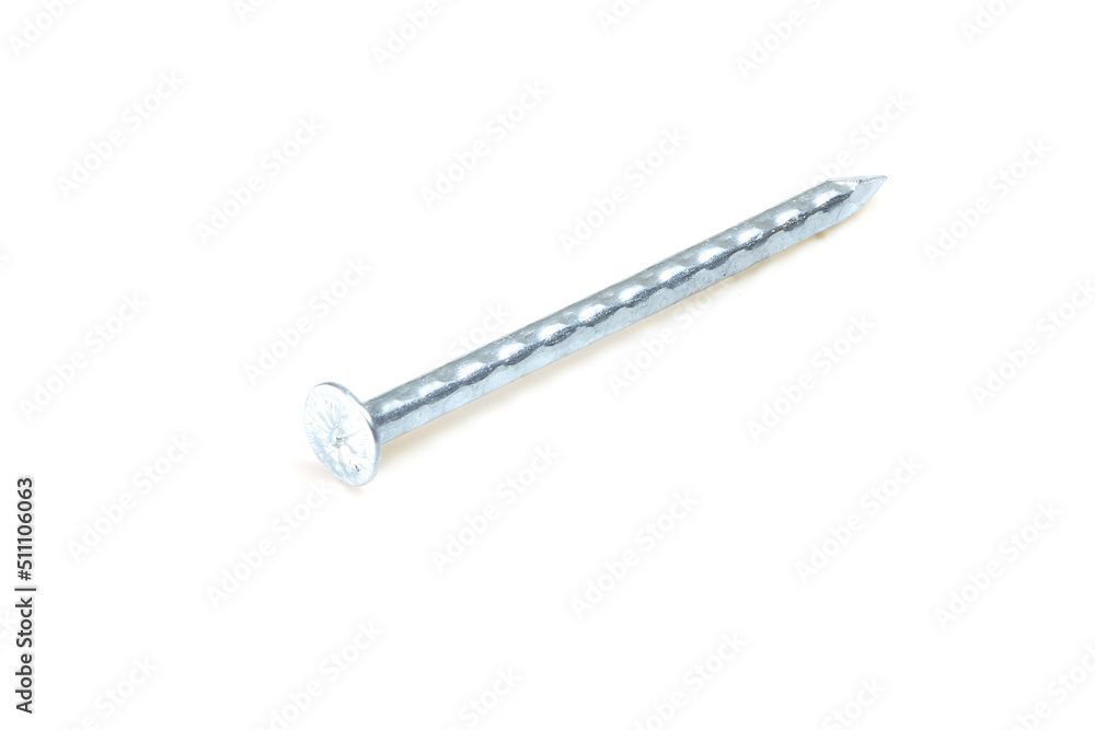 Metallic silver nail isolated on white background. Fasteners close-up. Metallic silver nail isolated on white background. Fasteners close-up.