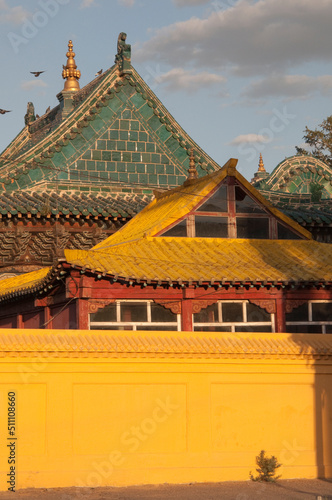 Roofs at Gandantegchinlen Monastery, Ulan Bator, with a beautiful sunset light. photo