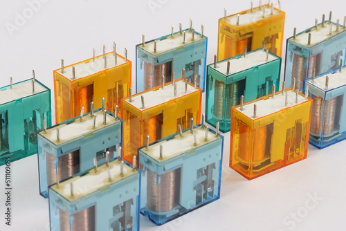 Electromagnetic relays for connecting loads in the control panel close-up.