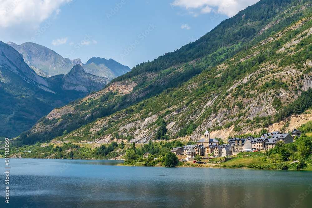 Views of the reservoir of Lanuza, Sallent de Gallego and Formigal town.