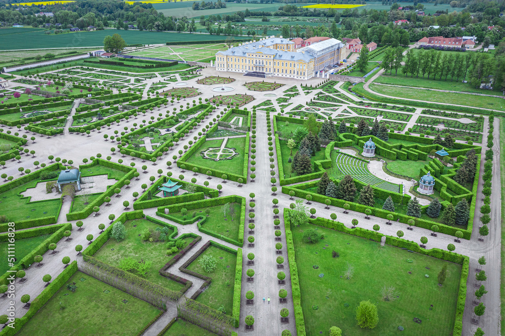 Aerial view on baroque garden of Rundale palace in summer time. Symmetrical park in vibrant green colors.