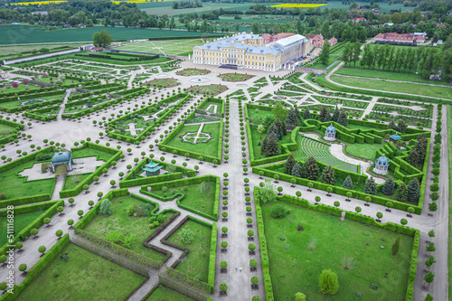 Obraz na płótnie Aerial view on baroque garden of Rundale palace in summer time. Symmetrical park in vibrant green colors. w salonie