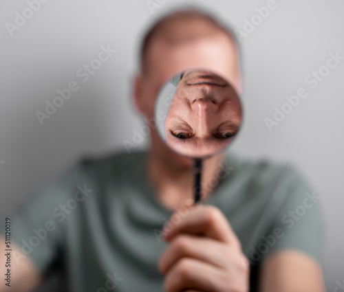 Man suffering from bipolar disorder, distorted self perception. High quality photo photo