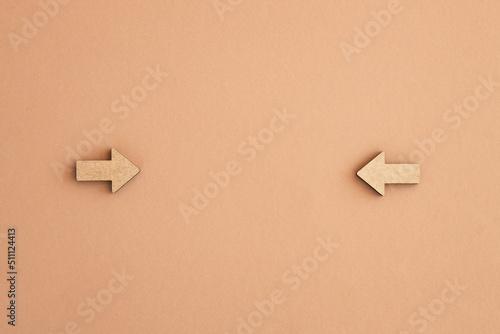 Business investment growth concept , Wooden arrows on beige background. Space for your text © ALEXSTUDIO