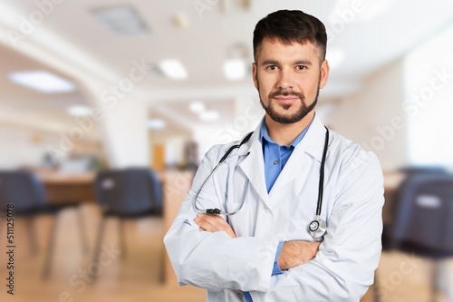Portrait of  young doctor working in a hospital. With Stethoscope In Hospital Office.