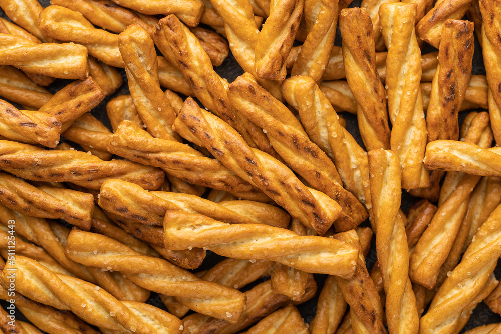 Salted pretzel sticks. Salted crackers. Salted pretzel sticks. Salted crackers.