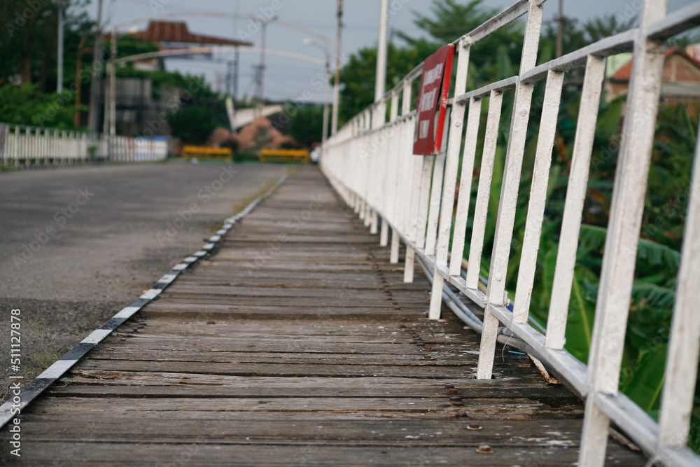 wooden bridge over the river