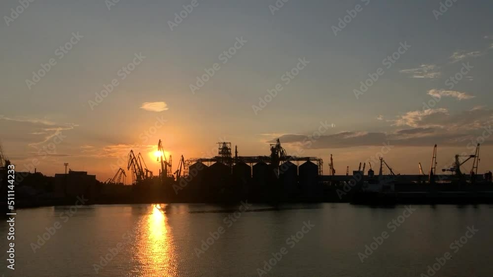 Sunset in the seaport of odessa, ukraine. Odessa, Ukraine, sea port. Blockade of Ukrainian seaports Sunset in the seaport of odessa, ukraine. Odessa, Ukraine, sea port. Blockade of Ukrainian seaports