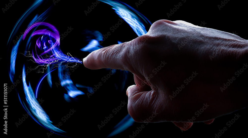 Electric plasma ball on a dark background. Static electricity model. Lightning.