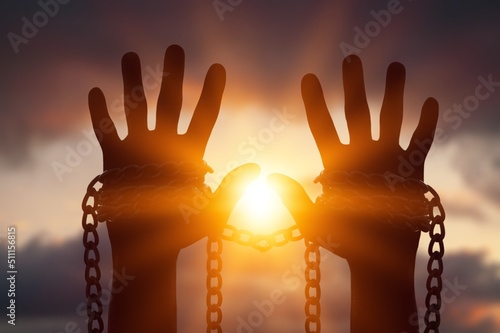 Silhouette kid with chain Freedom, Worship and Pray. Human rights. Child abuse. Pray faith hope