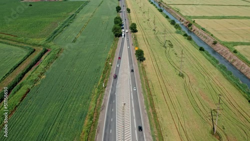 altitude view of the highway among the fields photo