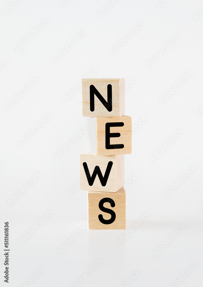 Cubic wooden blocks forming the 'news' text Cubic wooden blocks forming the 'news' text