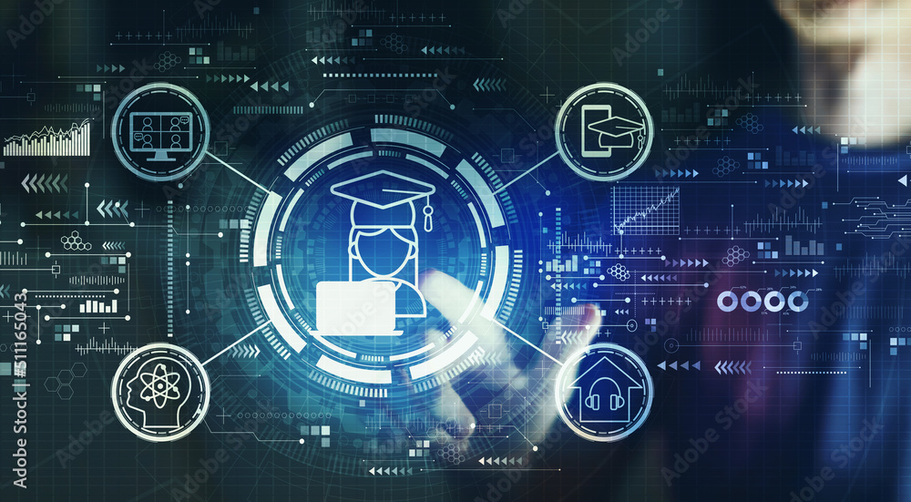 Distance learning theme with young man touching a digital screen at night Distance learning theme with young man touching a digital screen at night