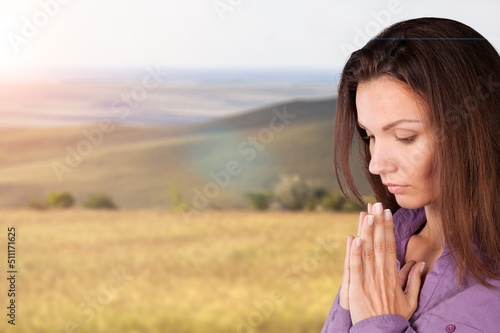 Canvas Print The person prays at sunset