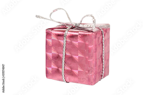 Pink gift box with a gray string on a white background isolate. Holiday concept.