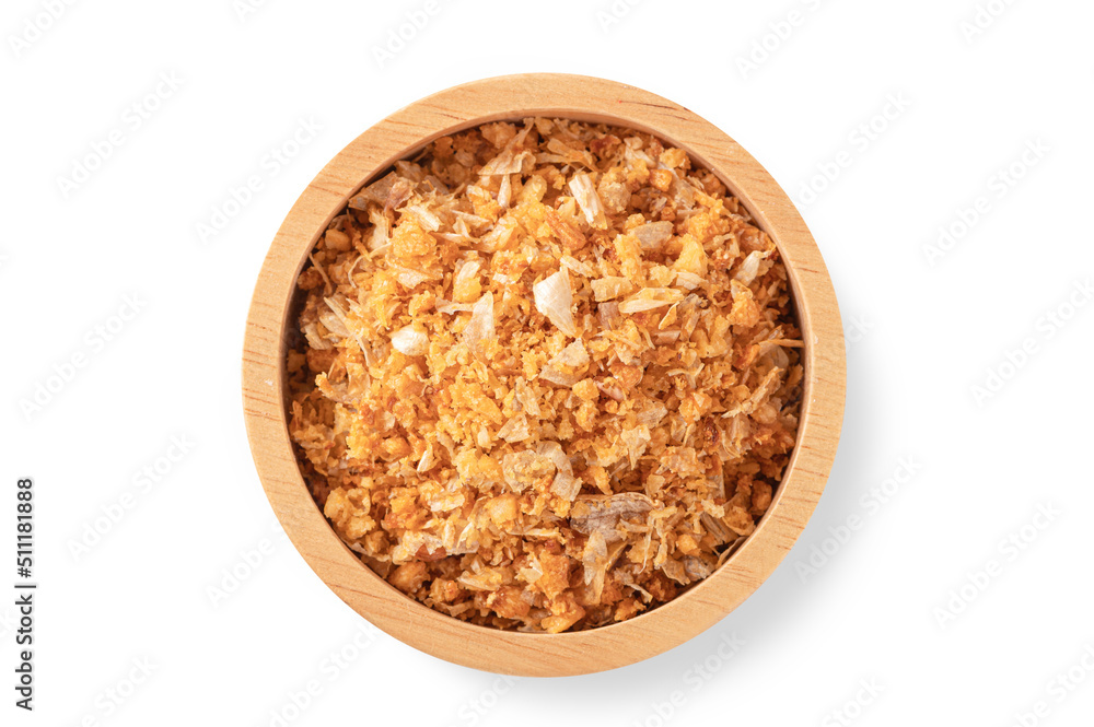 Fried garlic in wooden bowl isolated on white background. Top view Fried garlic in wooden bowl isolated on white background. Top view