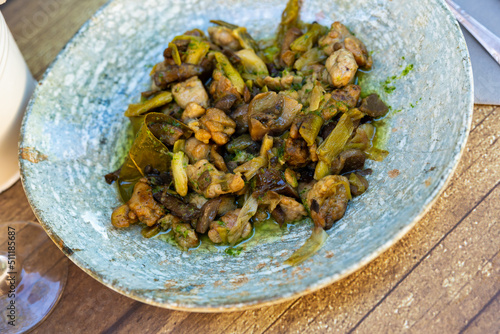 Lechecillas de ternasco, Aragonese dish made of lamb's glands, served on plate in restaurant. photo