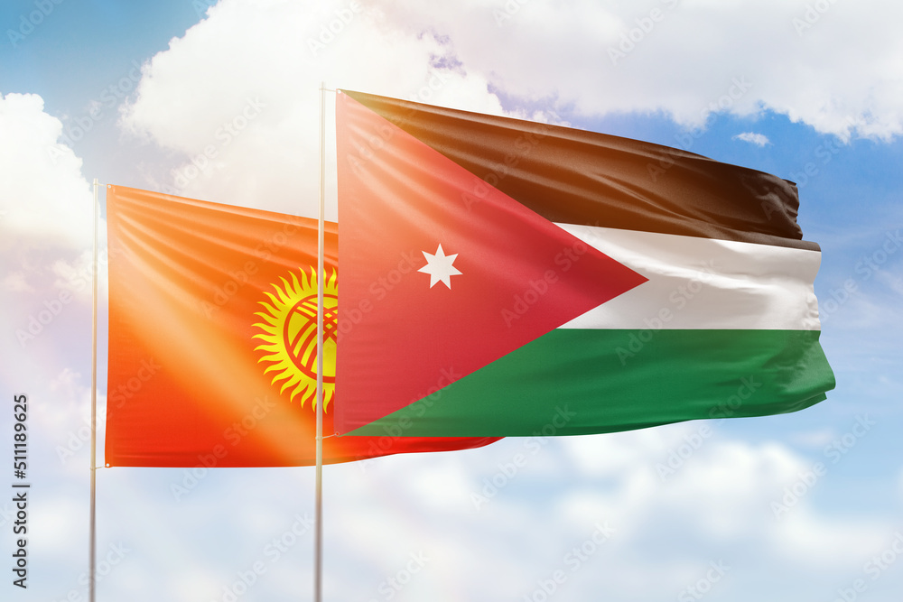 Sunny blue sky and flags of jordan and kyrgyzstan Sunny blue sky and flags of jordan and kyrgyzstan