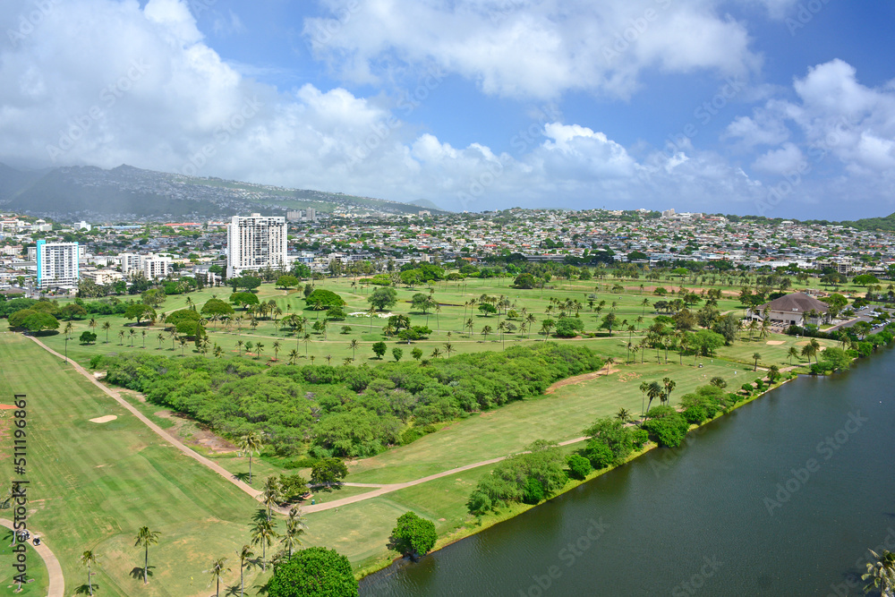 Views of Honolulu with public golf course near Waikiki on Oahu Island in Hawaii