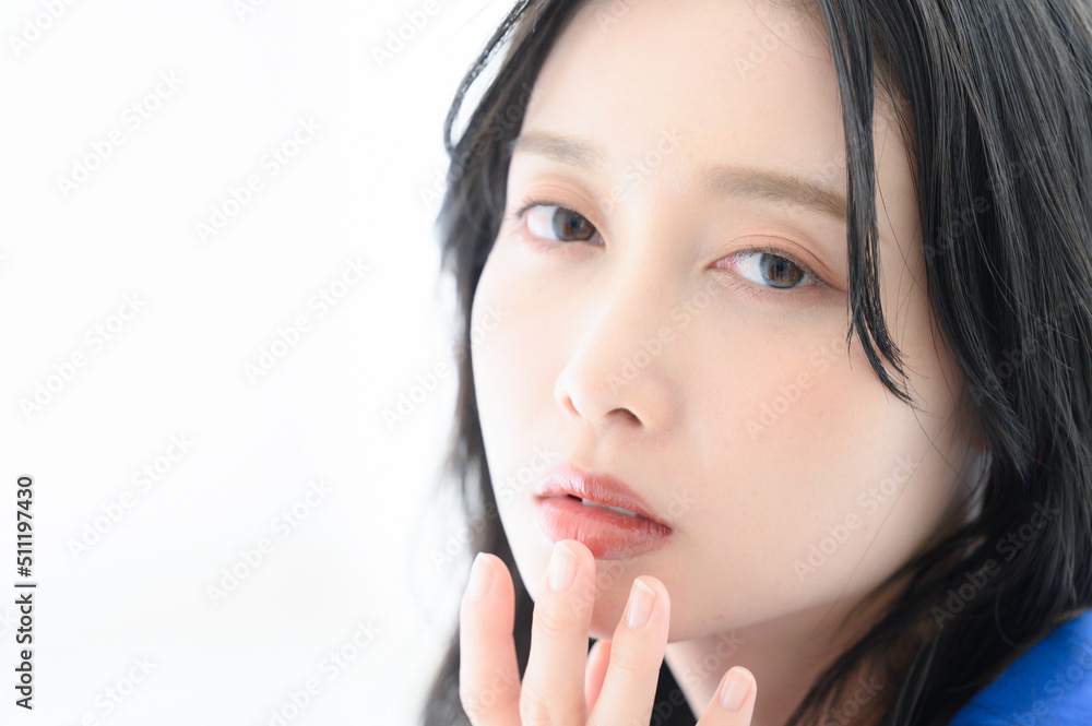 Portrait of a woman looking at the camera Portrait of a woman looking at the camera