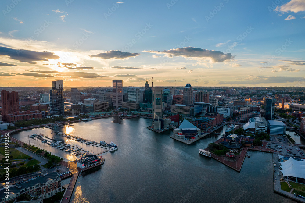 Fototapeta premium Aerial Drone View of Baltimore City Inner Harbor before Sunset with Blue Skies
