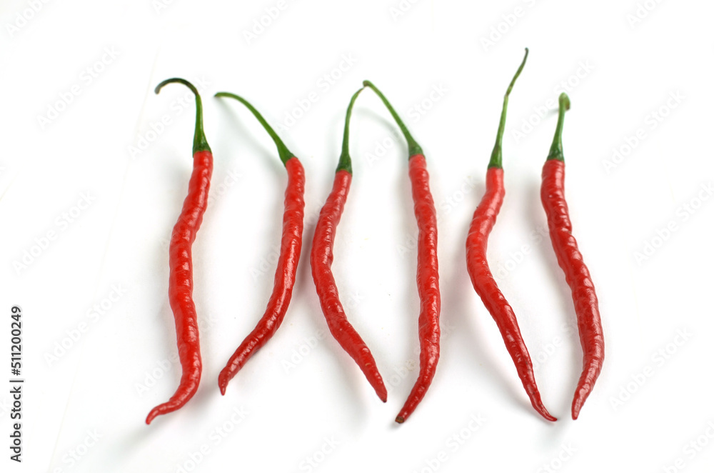 Chilli peppers red and hot on white background Chilli peppers red and hot on white background