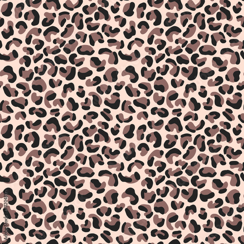Seamless abstract print with leopard skin imitation. Brown animal pattern for textile, wallpaper, scrapbook, fabric, Hand drawn illustration on a color background.