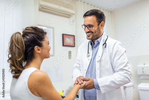 Healthcare and medical concept - doctor with patient in hospital. Doctor working in the office and listening to the patient, she is explaining her symptoms, healtcare and assistance concept