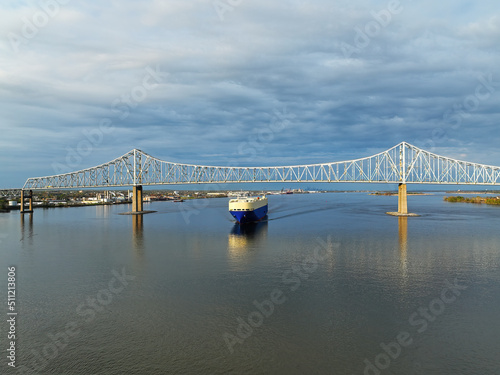 A Vehicle Carrier Ship Passing under the Commodore Barry Bridge  photo