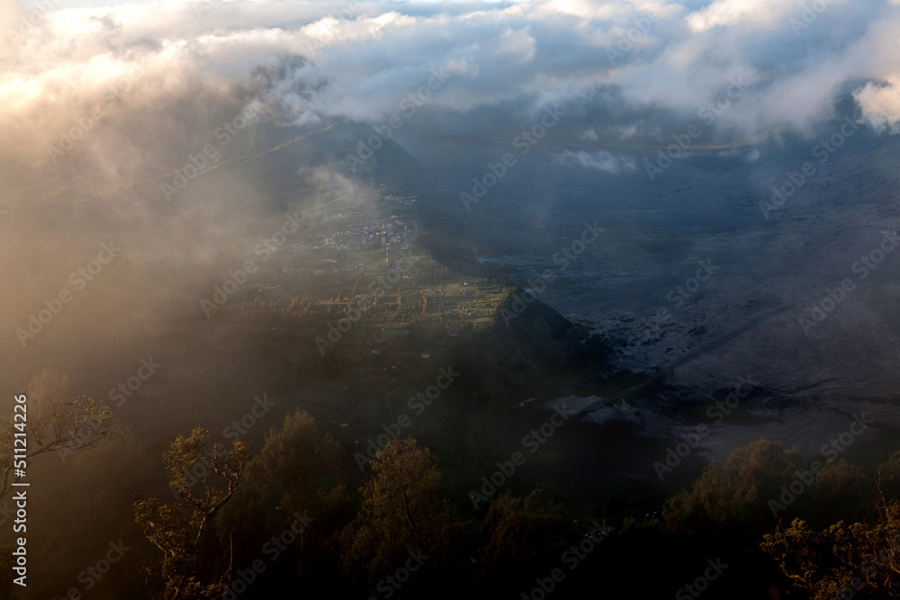 Fototapeta premium Bromo Mountain with Morning Mist, is Volcano Mountain in Surabaya, Indonesia