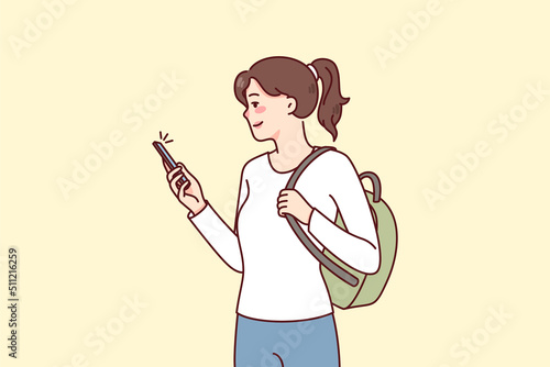 Smiling girl student with backpack using modern smartphone communicating online. Happy woman with cellphone browsing social networks on gadget. Flat vector illustration. 