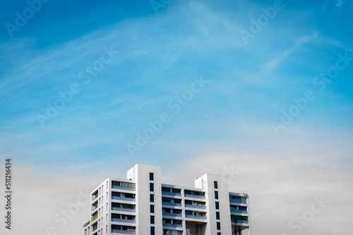 Building and blue sky with airplane in bangkok thailand. touristm concept. Selective focus.