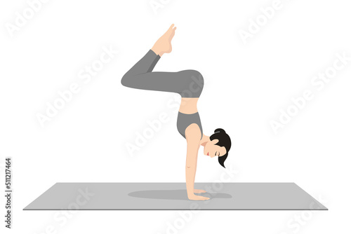 Bunny Hops Pose Handstand Prep. Beautiful girl practice Pike Handstand Pose. Young attractive woman practicing yoga exercise. working out, black wearing sportswear, grey pants and top, indoor full