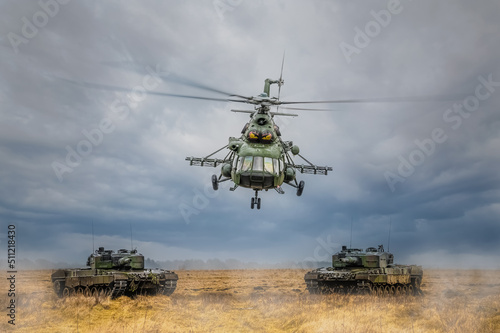 Śmigłowiec Mi-17 przelatujący nad czołgmai. Śmigłowiec i czołgi. Śmigłowiec przelatujący nisko. Śmigłowiec przelatujący nisko nad czołgami. Ochrona granicy białoruskiej. © Arkadiusz Baczyk