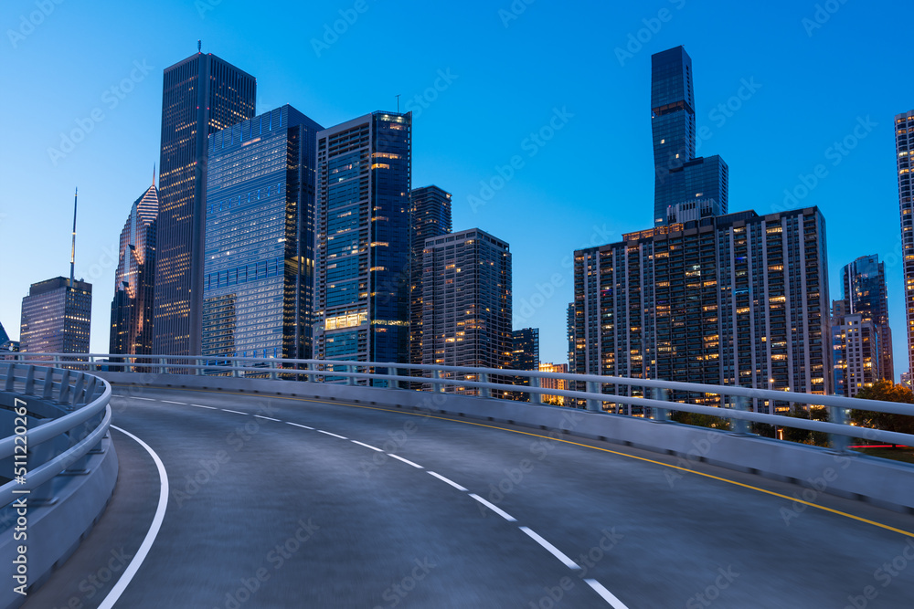 Obraz premium Empty urban asphalt road exterior with city buildings background. New modern highway concrete construction. Concept of way to success. Transportation logistic industry fast delivery. Chicago. USA.